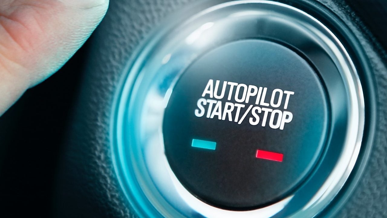 Finger pressing auto pilot start button