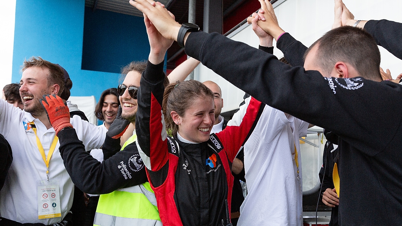 young people celebrating, smiling