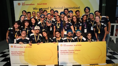 Shell Eco-marathon Brazil 2026 participants holding technical inspection approval certificates during the competition.