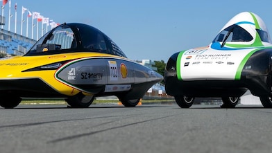 three Shell Eco-marathon vehicles lined up on track