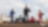 Three drivers stand in front of their vehicles