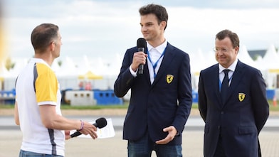 Ferrari representative on microphone
