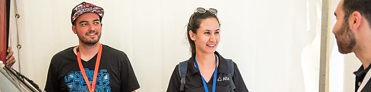 Shell Eco-marathon team stand around red car