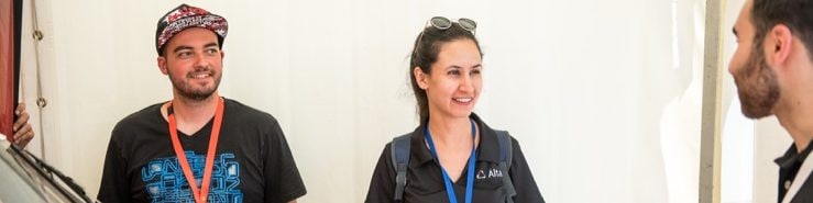 Shell Eco-marathon team stand around red car