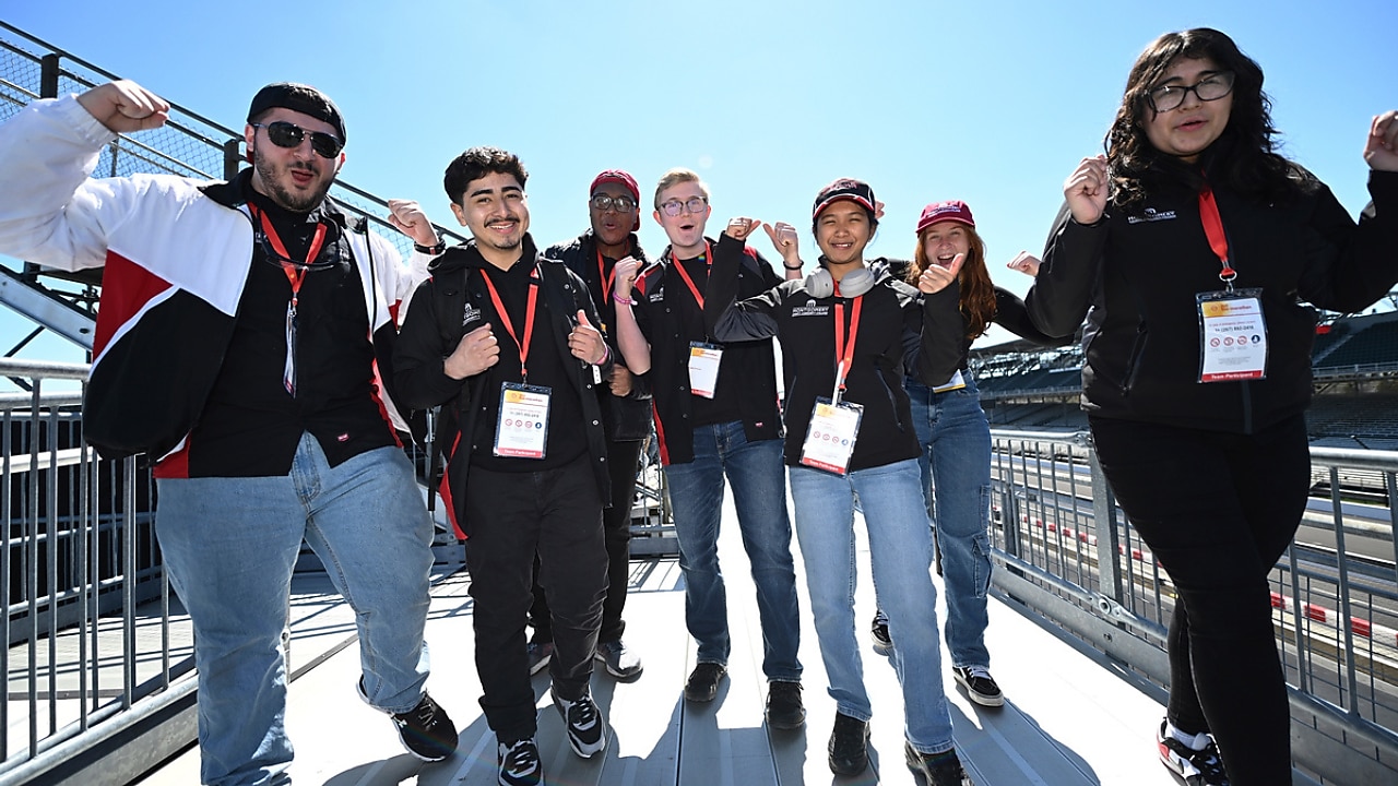 cheerful students posing for the camera