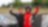 Two people in a helmet and driver's suits celebrating