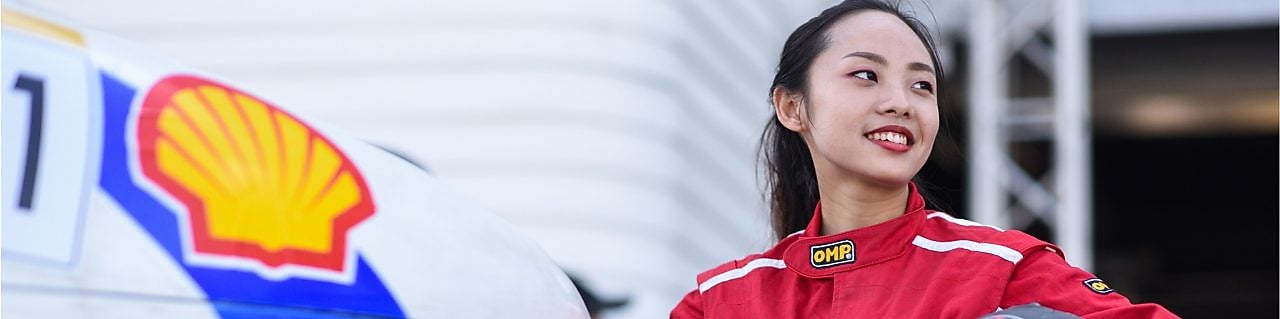 Women standing with helmet